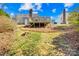 Lawn view of the home featuring a deck and backyard at 1133 Bloom Wood Ln, Matthews, NC 28105