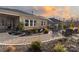 Scenic backyard view with stone path, water feature, and outdoor seating at 12609 Twilight Dr, Mint Hill, NC 28227