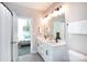 Inviting bathroom featuring a double sink vanity, modern fixtures, and neutral color palette at 12609 Twilight Dr, Mint Hill, NC 28227