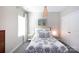 Cozy bedroom with decorative bedspread, bedside tables, and natural light from the window at 12609 Twilight Dr, Mint Hill, NC 28227
