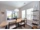 Bright dining area with access to the outdoor screened porch through sliding glass doors at 12609 Twilight Dr, Mint Hill, NC 28227