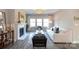 Bright living room boasts a fireplace, large windows, and stylish modern decor at 12609 Twilight Dr, Mint Hill, NC 28227