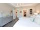 Airy main bedroom with access to walk-in closet and ensuite bathroom, featuring hardwood floors at 12609 Twilight Dr, Mint Hill, NC 28227