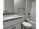 Bathroom featuring a granite countertop and white cabinets at 1425 Wildwood Dr, Kannapolis, NC 28081
