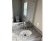 Bathroom featuring a granite countertop and a large mirror at 1425 Wildwood Dr, Kannapolis, NC 28081