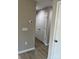 Hallway featuring a light-colored floor and a white double door at 1425 Wildwood Dr, Kannapolis, NC 28081