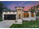 Charming one-story home with a modern design, stylish garage, and inviting front entrance at 17201 Green Hill Rd, Charlotte, NC 28278