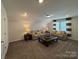 Cozy living room with plush sofas, neutral decor, and natural light at 228 Heatherland Dr, Rock Hill, SC 29732