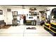 Organized garage space with workbench, storage solutions and door leading to the interior of the house at 2617 Manor Stone Way, Indian Trail, NC 28079