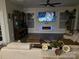 Bright living room boasts a modern fireplace and decorative accents at 2617 Manor Stone Way, Indian Trail, NC 28079