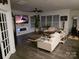 Cozy living room featuring a modern fireplace and a large TV at 2617 Manor Stone Way, Indian Trail, NC 28079