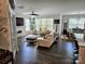 Bright living room features a cozy seating area, fireplace, and plenty of natural light at 2617 Manor Stone Way, Indian Trail, NC 28079