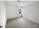 Bedroom featuring neutral carpet, one window, and neutral walls at 2643 Meadow Knoll Dr, Charlotte, NC 28269