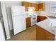 Functional kitchen featuring white appliances, ample cabinet space, and a clean design for easy meal prep at 2643 Meadow Knoll Dr, Charlotte, NC 28269
