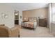 Comfortable bedroom with an ensuite bathroom and plenty of natural light at 305 Hemlock Bluff Ct, Denver, NC 28037