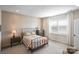 Cozy bedroom with hardwood floors and a window providing natural light at 305 Hemlock Bluff Ct, Denver, NC 28037