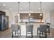 Well-equipped kitchen with stainless steel appliances, granite countertops, and modern lighting at 305 Hemlock Bluff Ct, Denver, NC 28037