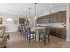 Spacious kitchen featuring a large island, modern appliances, and plenty of seating at 305 Hemlock Bluff Ct, Denver, NC 28037