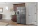 Modern kitchen featuring stainless steel refrigerator and plenty of cabinet space at 305 Hemlock Bluff Ct, Denver, NC 28037