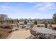 Beautiful outdoor patio with fire pit, chairs, and landscaping at 305 Hemlock Bluff Ct, Denver, NC 28037