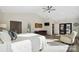 Primary bedroom with high ceilings, a seating area, and a double door to the outside at 324 Patternote Rd, Mooresville, NC 28117