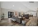 Expansive open floor plan with a living room, dining area, and modern kitchen at 324 Patternote Rd, Mooresville, NC 28117