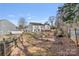 Backyard view of the wooden deck and siding on the house at 3247 Bamburgh Ct, Charlotte, NC 28216