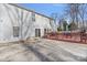 The backyard has a wooden deck with a white siding house in the background at 3247 Bamburgh Ct, Charlotte, NC 28216