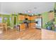Bright kitchen with stainless steel appliances, wooden cabinets, and eat in breakfast area at 3247 Bamburgh Ct, Charlotte, NC 28216