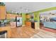 Updated kitchen with stainless steel appliances and breakfast bar that overlooks the living area at 3247 Bamburgh Ct, Charlotte, NC 28216