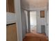 Hallway offering glimpses of the rooms with linoleum flooring at 335 Lake Landing Dr, Salisbury, NC 28146