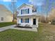 Charming two-story home with blue shutters and a cozy front porch, perfect for enjoying quiet evenings at 4070 Shasta Cir, Clover, SC 29710