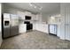 Modern kitchen features stainless steel appliances, white cabinets, and ample counter space, great for cooking at 4070 Shasta Cir, Clover, SC 29710