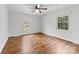 Bright bedroom features hardwood flooring and double hung windows for natural light at 410 Deerwood Dr, Gastonia, NC 28054