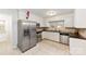 Well-lit kitchen featuring stainless steel appliances and granite countertops at 410 Deerwood Dr, Gastonia, NC 28054
