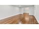 Spacious living room with hardwood floors and view into adjacent room at 410 Deerwood Dr, Gastonia, NC 28054