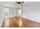 Spacious main bedroom featuring hardwood floors and ensuite bathroom at 410 Deerwood Dr, Gastonia, NC 28054