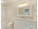 Clean, white bathroom featuring modern fixtures, vanity with marble countertop, and classic tile at 5011 Sharon Rd # J, Charlotte, NC 28210