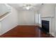 Living room with hardwood floors and fireplace; ready for personalized design at 5084 Parkview Way, Matthews, NC 28104