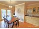 Inviting dining area with a table set for six and access to outdoor deck at 720 9Th Nw Ave, Hickory, NC 28601