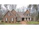 Charming brick home with dark shutters and a welcoming front porch at 720 9Th Nw Ave, Hickory, NC 28601