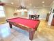 Game room features a pool table, small dinette set, and tiled floors at 720 9Th Nw Ave, Hickory, NC 28601
