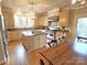 Well-lit kitchen featuring stainless steel appliances, an island and a breakfast nook at 720 9Th Nw Ave, Hickory, NC 28601