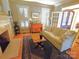 Inviting living room features fireplace, hardwood floors, sofa and access to the outdoors at 720 9Th Nw Ave, Hickory, NC 28601