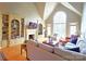Cozy living room with built-in bookcases, a fireplace, and large windows at 720 9Th Nw Ave, Hickory, NC 28601