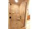 Shower with glass door and tile surround at 720 9Th Nw Ave, Hickory, NC 28601