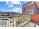 Balcony with great views of parking lot and the street through a green metal railing, ideal for relaxation at 720 Governor Morrison St # 207, Charlotte, NC 28211