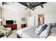 Bedroom featuring modern decor, ceiling fan, hardwood floors, and ample natural light at 720 Governor Morrison St # 207, Charlotte, NC 28211