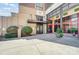 Attractive building entrance with manicured landscaping, providing a welcoming and professional first impression at 720 Governor Morrison St # 207, Charlotte, NC 28211