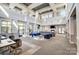 Spacious lobby area with high ceilings, elegant seating, and abundant natural light, perfect for residents and guests at 720 Governor Morrison St # 207, Charlotte, NC 28211